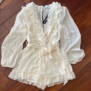Fashion Nova Cream Ruffled Ramper🩷